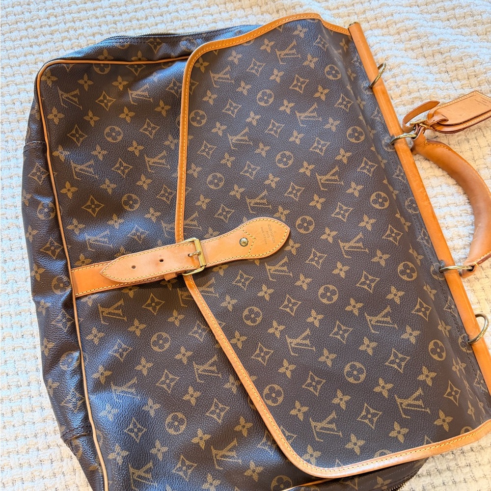 Louis Vuitton vintage travel bag.